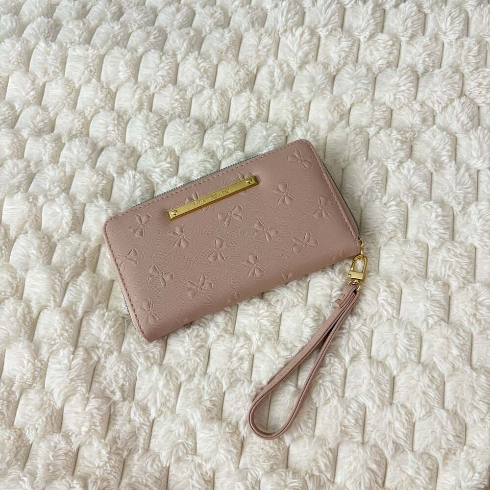 Betsey Johnson Pink Bow Debossed Zip Around Wristlet Wallet